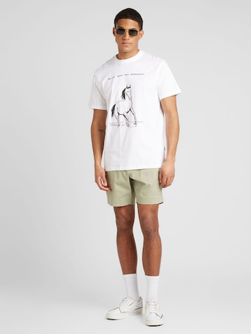 DEDICATED. Bluser & t-shirts 'Stockholm No Responsibility' i hvid