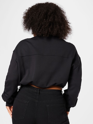 ReebokSweater majica - crna boja