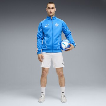 PUMA Trainingsjack 'Island King Anthem' in Blauw