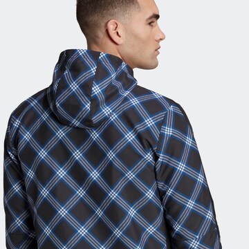 ADIDAS SPORTSWEAR Sportjacke 'Tiro' in Schwarz