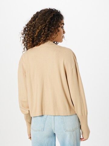 Sisley Cardigan i beige