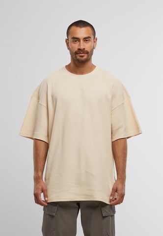 T-Shirt Karl Kani en beige : devant