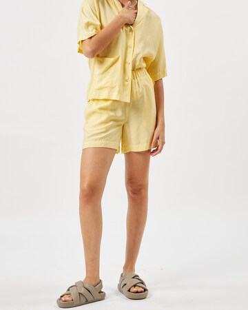 minimum Loose fit Trousers 'Acazia' in Yellow