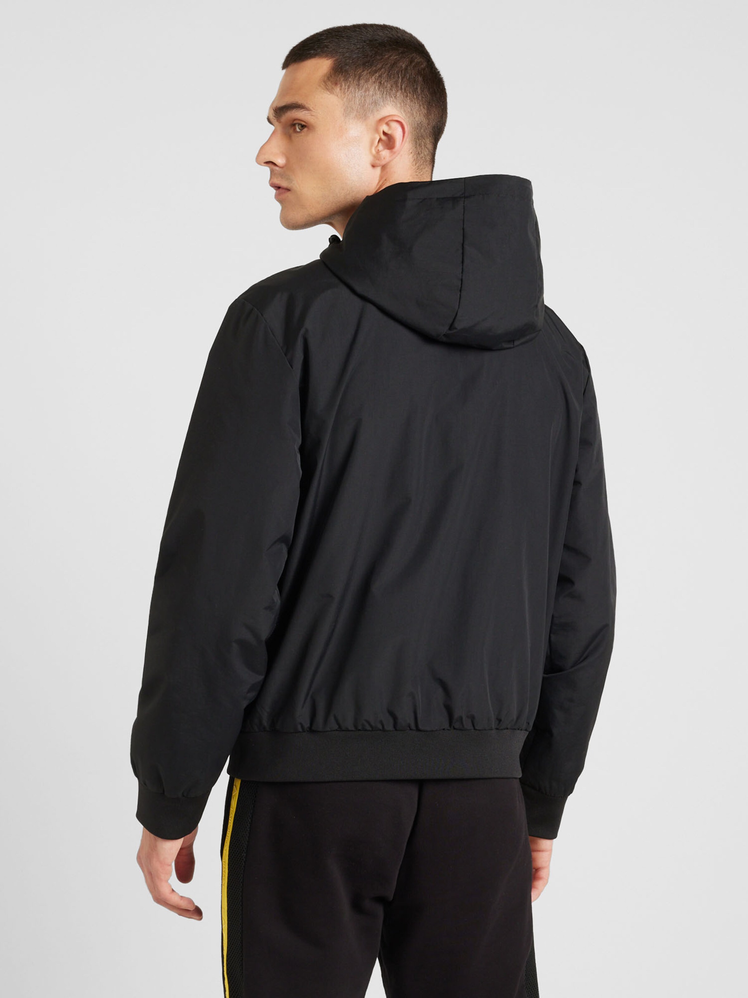 Emporio Armani Regular fit Geacă de primăvară-toamnă pe Negru