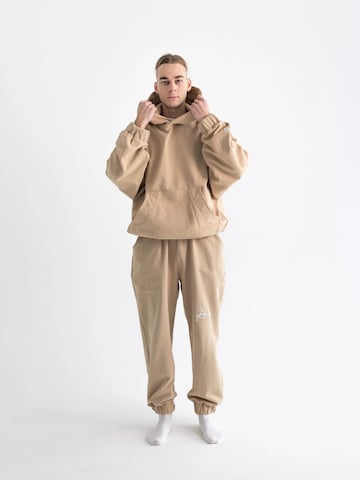 Tuta da jogging di BTY in beige: frontale