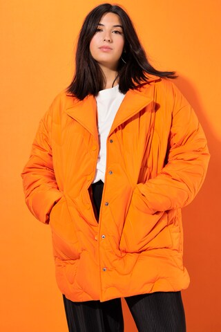 Studio Untold Tussenjas in Oranje