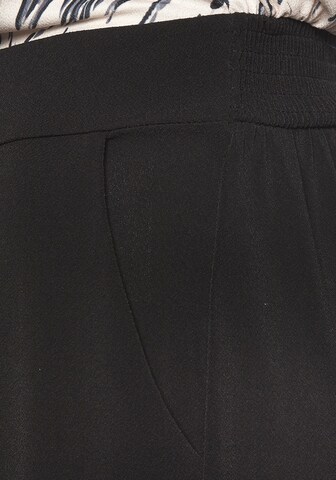 Tuta jumpsuit di LASCANA in beige