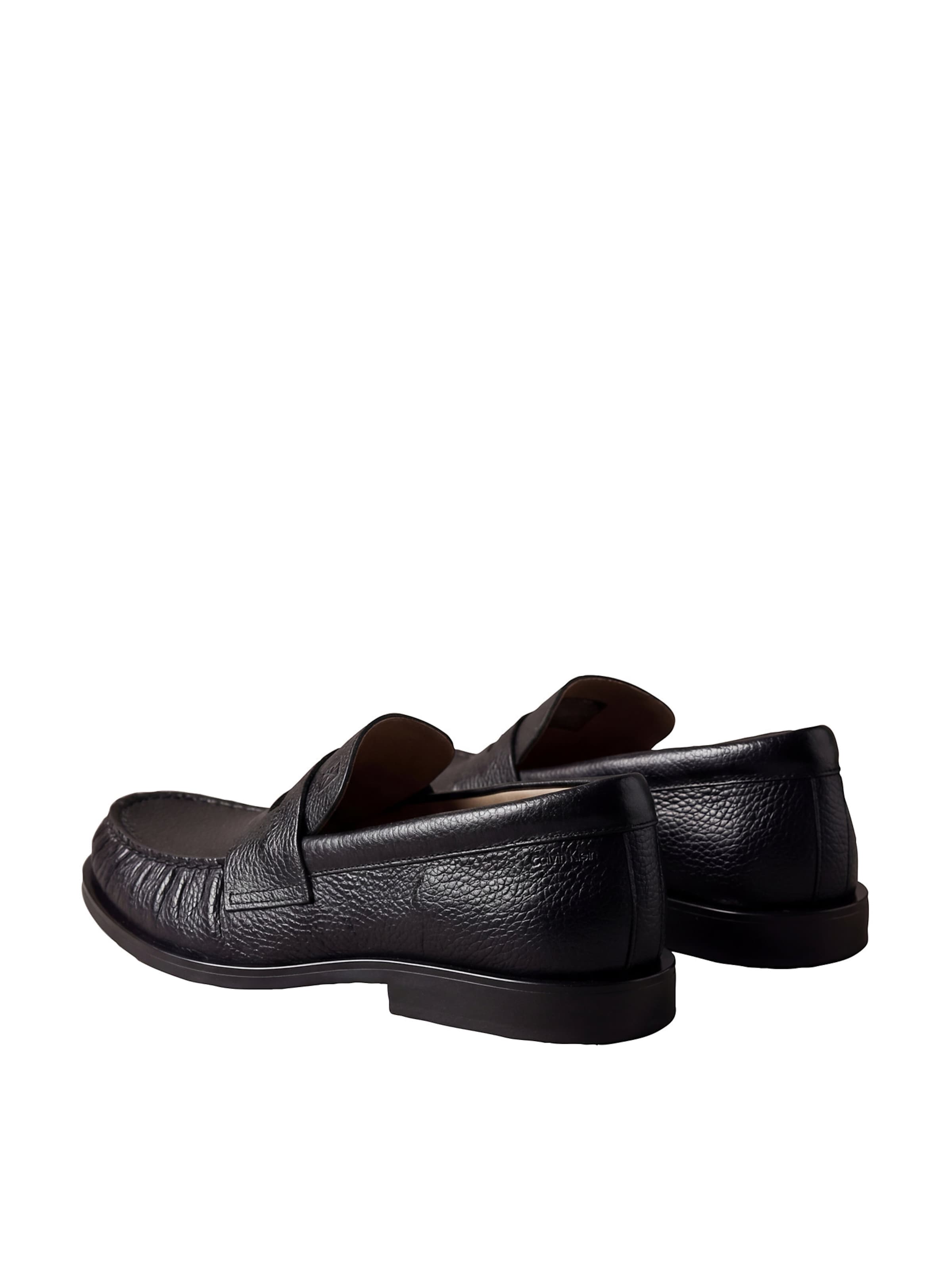 Calvin Klein Slip-ons in Black