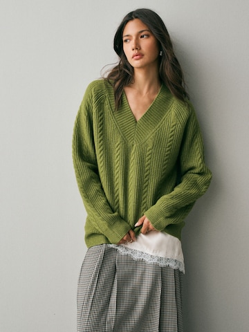 Next - Jersey en verde: frente