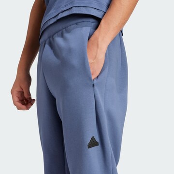 ADIDAS SPORTSWEAR Tapered Sportbroek 'Z.N.E. Premium' in Blauw