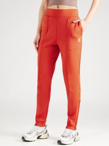 Effilé Pantalon de sport 'Heritage' NIKE en marron : devant