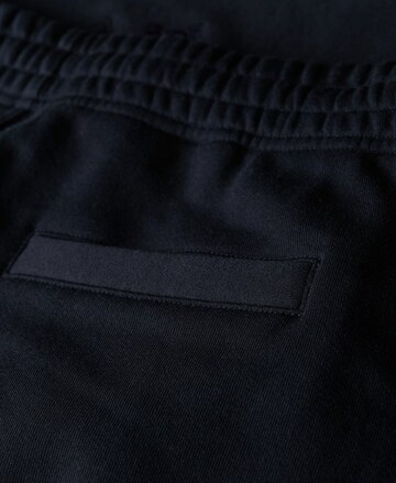 Superdry Regular Pants 'Essential' in Blue