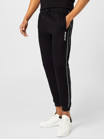 GUESS Tapered Pants 'Mickey' in Black: front