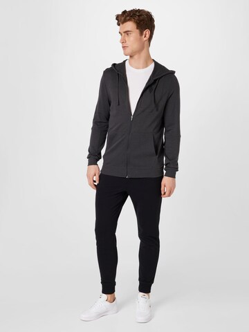 SKECHERS Tapered Sportbroek in Zwart