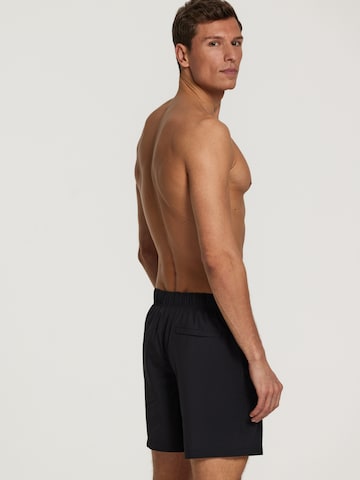 Shiwi Zwemshorts 'easy mike solid 4-way stretch' in Zwart