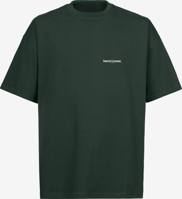 here\
ow. Shirt 'Unison' in Green: front