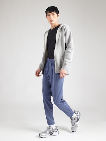 Effilé Pantalon de sport 'TOTALITY' NIKE en bleu