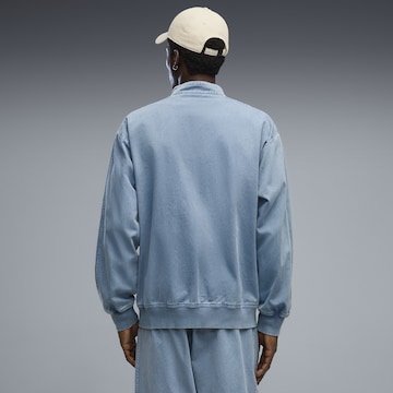 PUMA Trainingsjack 'FUTURE.PUMA.ARCHIVE T7' in Blauw