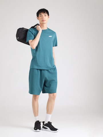 PUMA Λειτουργικό μπλουζάκι 'Essentials No. 1' σε πράσινο