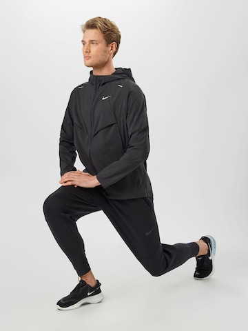 NIKE Спортно яке в черно