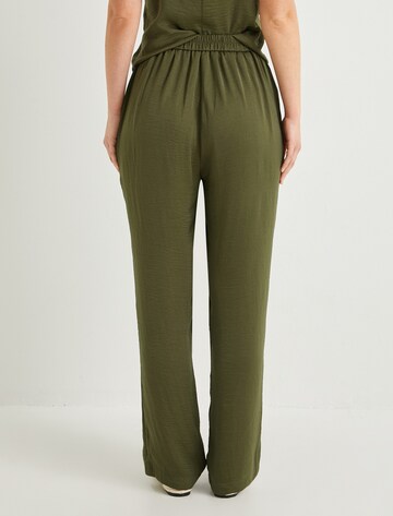 Koton Loose fit Pleat-front trousers in Green
