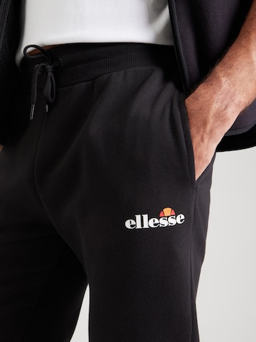 ELLESSE Zúžený strih Nohavice 'Cravo 2' - Čierna