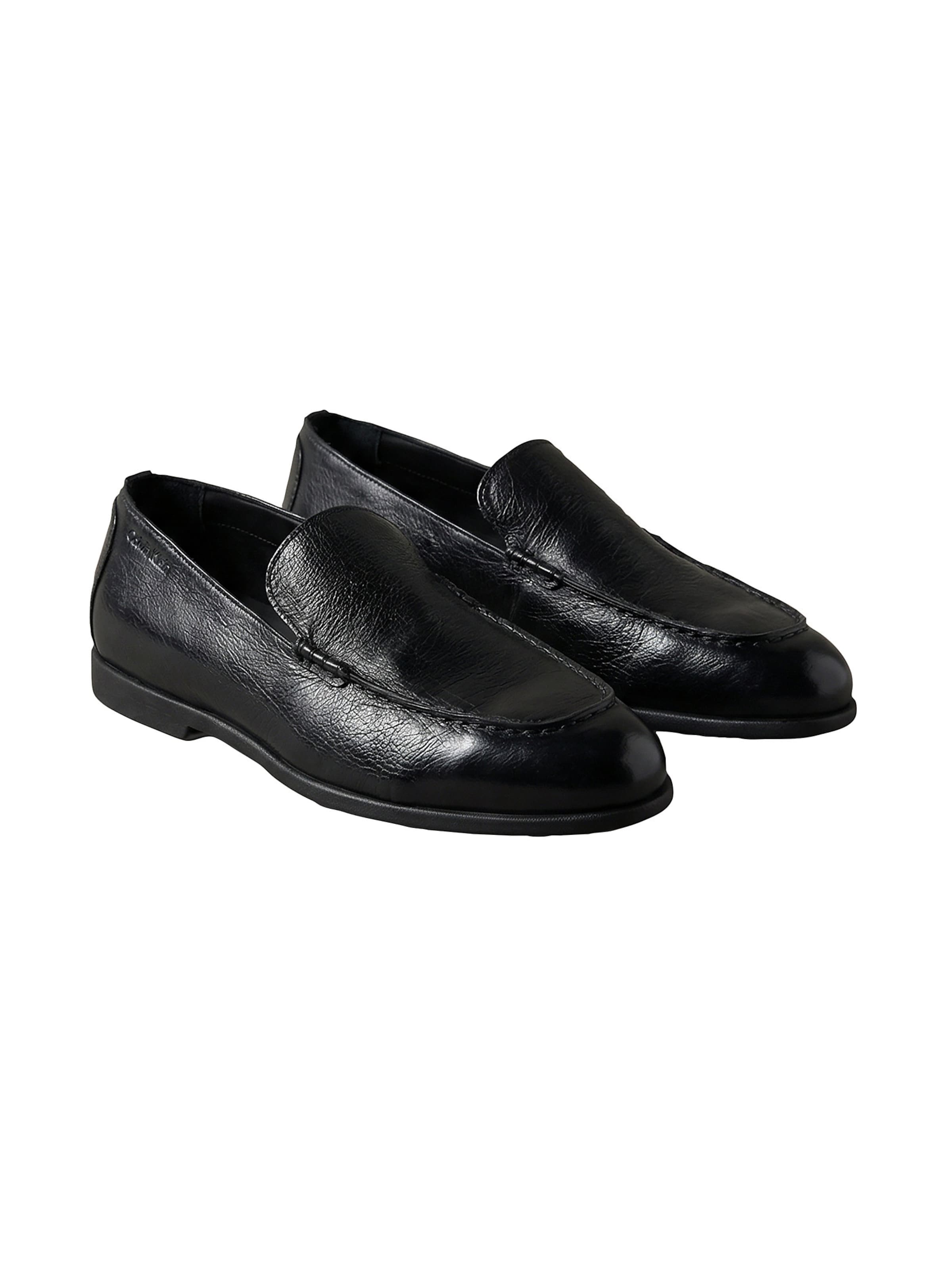 Calvin Klein Slip-ons in Black