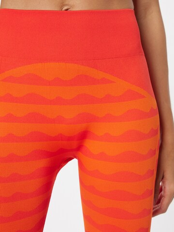ADIDAS SPORTSWEAR Skinny Sportovní kalhoty 'Marimekko Aero' – oranžová