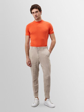 Antioch Regular Trousers in Beige: front