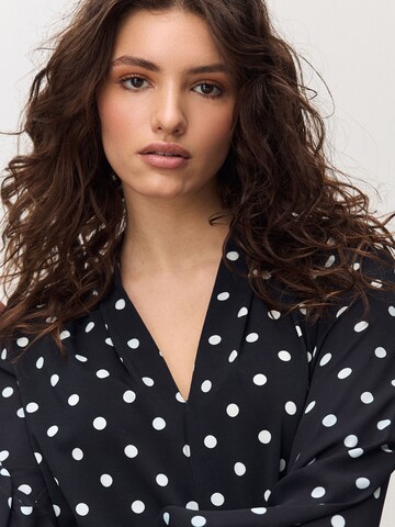 Next - Blusa en negro