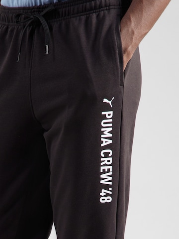 Tapered Pantaloni sport de la PUMA pe negru