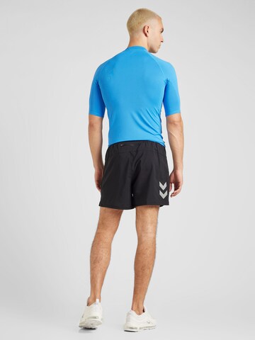 Hummel Regular Sports trousers in Black