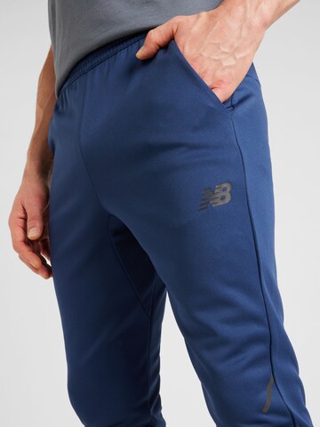 Effilé Pantalon de sport 'Tenacity' new balance en bleu