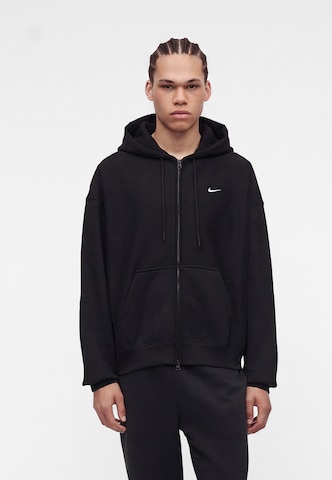 Nike Sportswear - Casaco em moletão em preto: frente