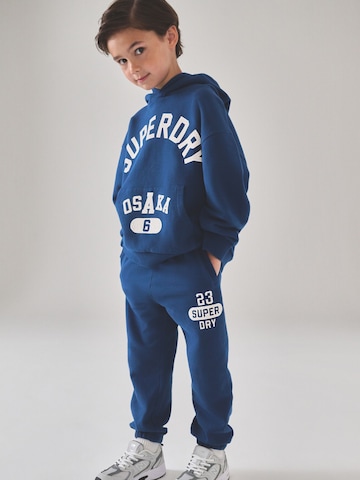 Superdry Облекло за бягане в синьо: отпред