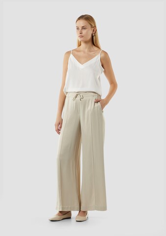 COMMA Loose fit Trousers in Beige: front