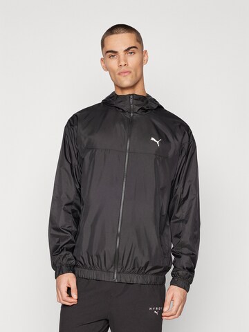 PUMA - Casaco deportivo 'ESS' em preto: frente