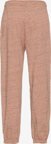 Nike Sportswear Tapered Pants in Pink