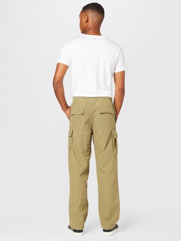 Loosefit Pantaloni cu buzunare 'Joshua' de la WEEKDAY pe verde