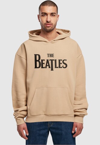 Merchcode Sweatshirt 'Beatles - Headline' in Bruin: voorkant