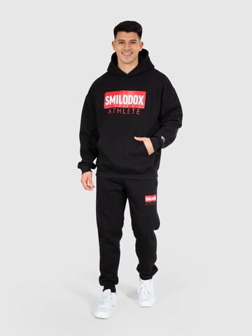 Effilé Pantalon de sport ' Athlete' Smilodox en noir