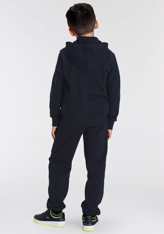 Champion Authentic Athletic Apparel Tracksuit in Blue