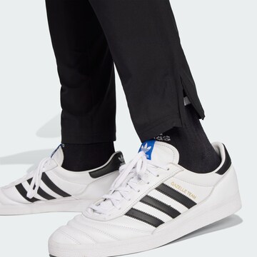 Skinny Pantalon de sport 'Tiro 25' ADIDAS PERFORMANCE en noir