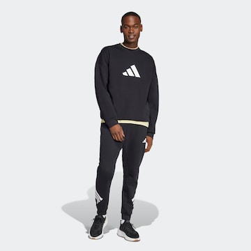 ADIDAS SPORTSWEAR Tapered Παντελόνι φόρμας 'Future Icons' σε μαύρο