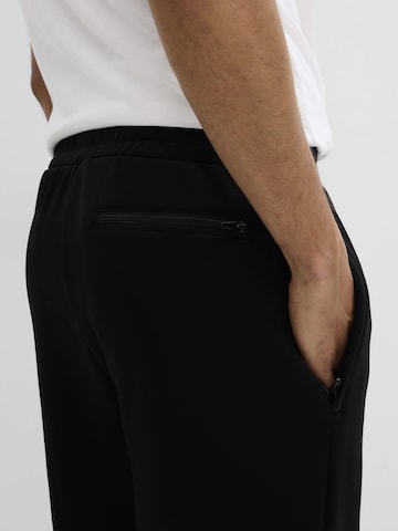 Effilé Pantalon bonprix en noir