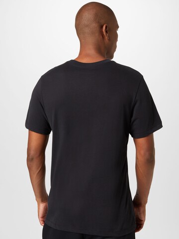 NIKE - Camiseta funcional en negro