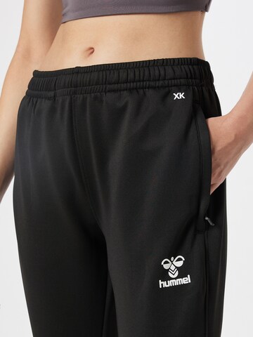 Hummel Slim fit Sports trousers in Black