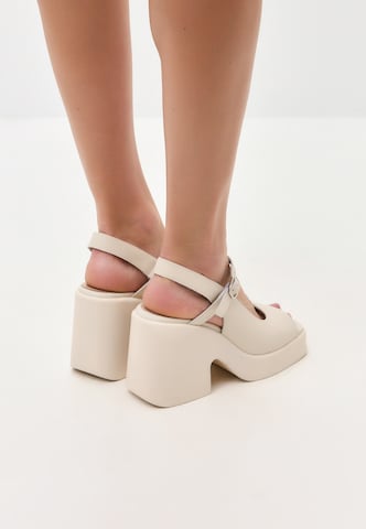 CESARE GASPARI Slingback pumps in White