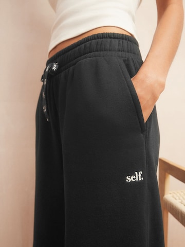 Next Wide Leg Sporthose in Schwarz
