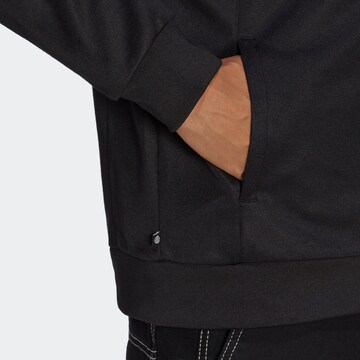 ADIDAS ORIGINALS Φθινοπωρινό και ανοιξιάτικο μπουφάν 'Adicolor Classics Cut Line' σε μαύρο